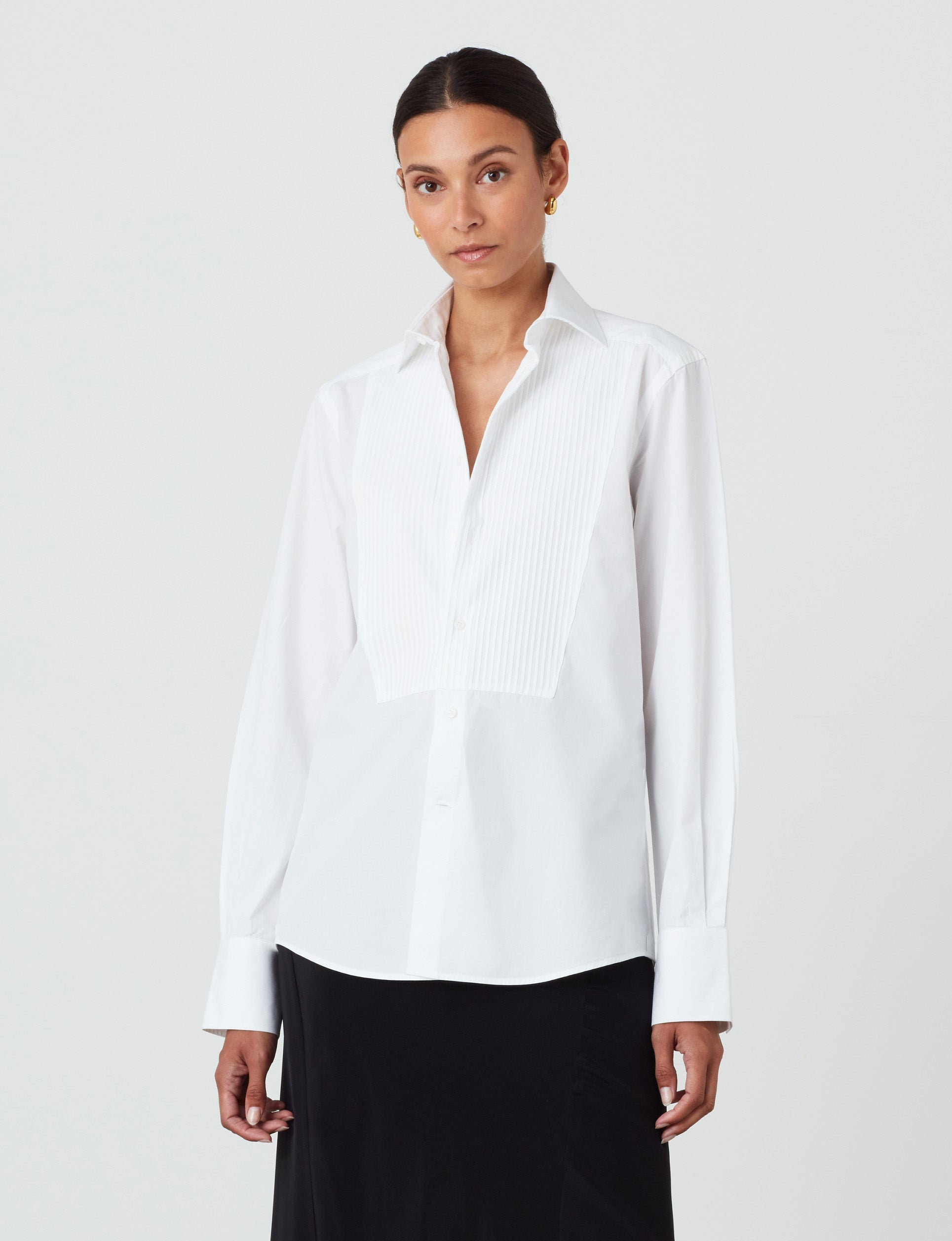 Impeccable Tailoring: Borrowed from the boys at its finest. The WNU Dress Shirt is a masterclass in classic tailoring; taking the traditional men’s black tie attire and adjusting it perfectly for women.